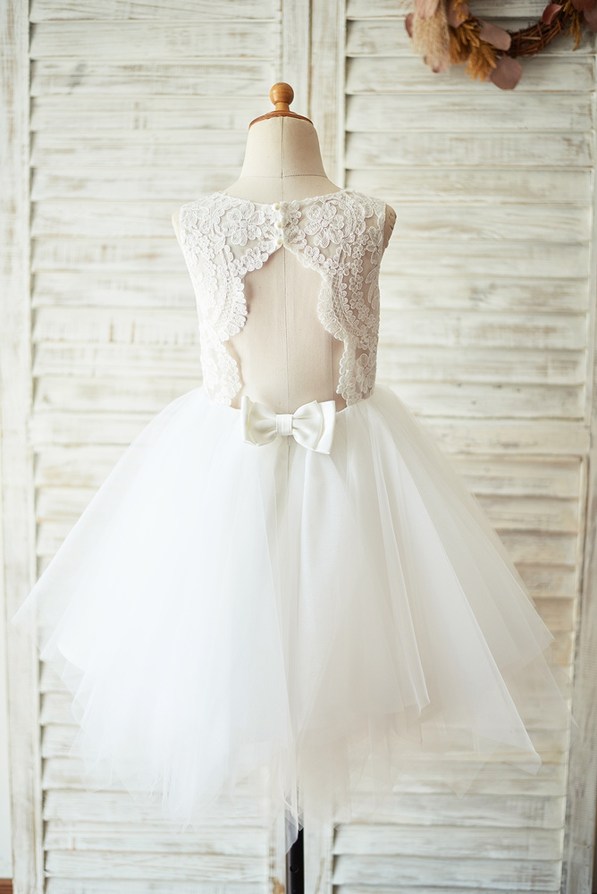 12 Cutest Flower Girl Dresses With Bows You'll Love