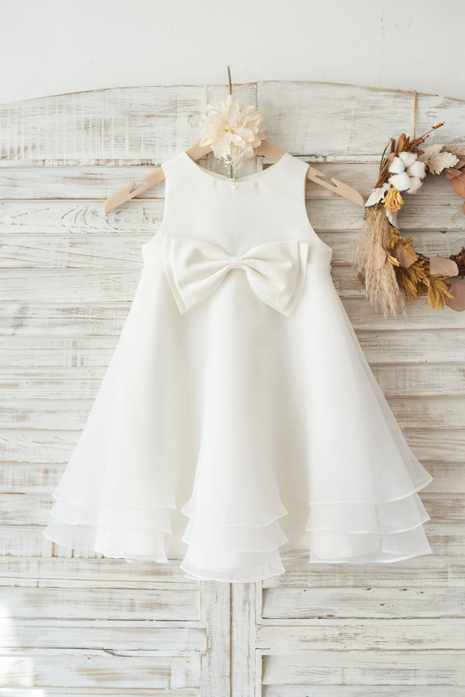 12 Cutest Flower Girl Dresses With Bows You'll Love