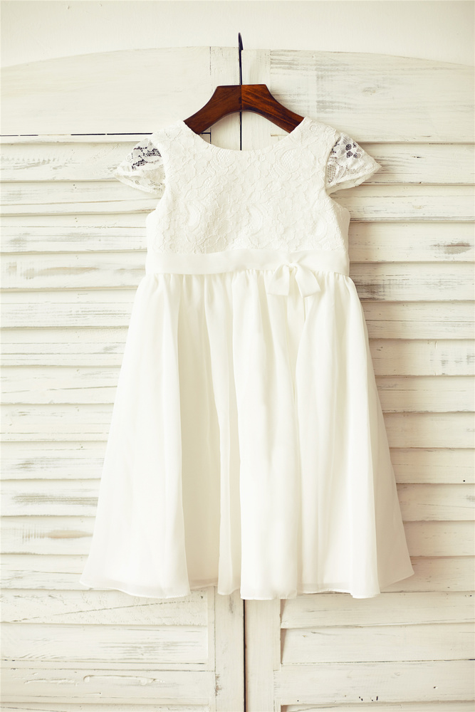 12 Cutest Flower Girl Dresses With Bows You'll Love