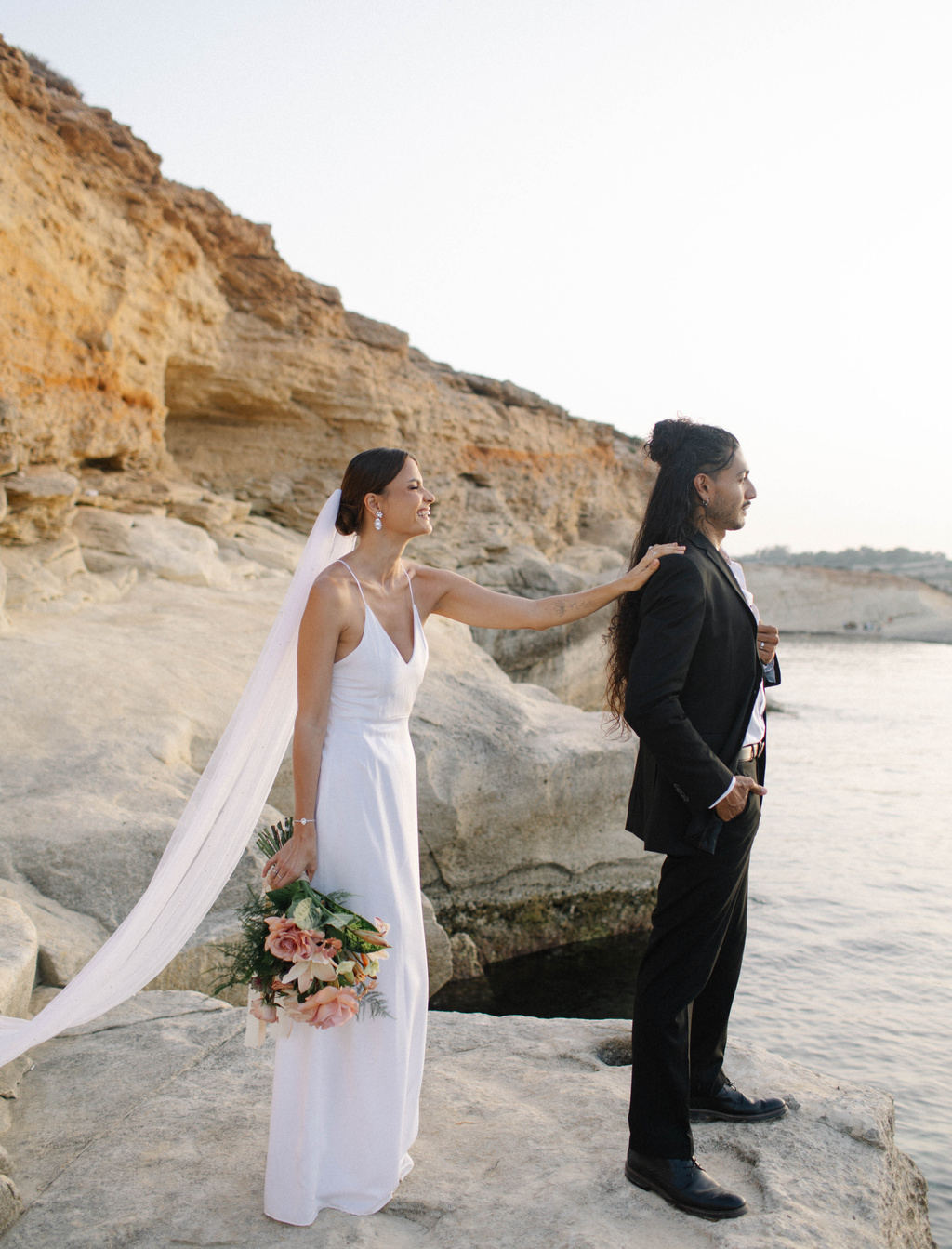An Intimate Elopement Along Malta's Coastline: A Bridal Editorial Amidst Munxar's Cliffs