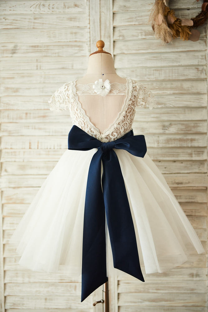 12 Cutest Flower Girl Dresses With Bows You'll Love
