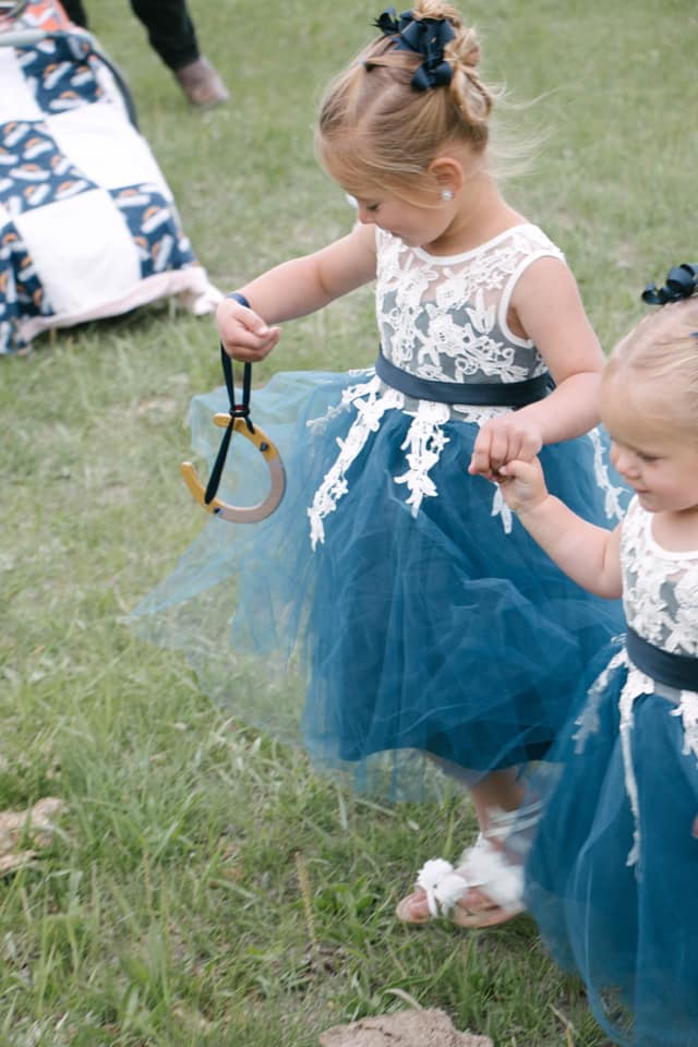 Customer Wearing Our Stunning Navy Blue Flower Girl Dress