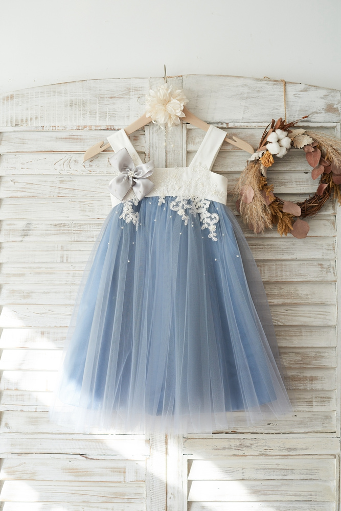 12 Cutest Flower Girl Dresses With Bows You'll Love