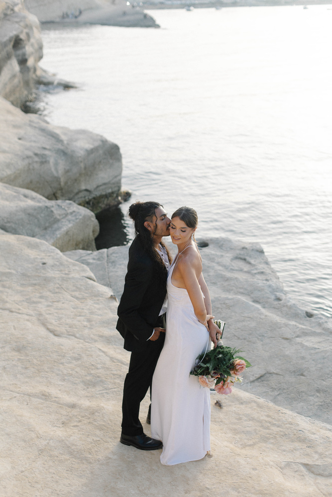 An Intimate Elopement Along Malta's Coastline: A Bridal Editorial Amidst Munxar's Cliffs