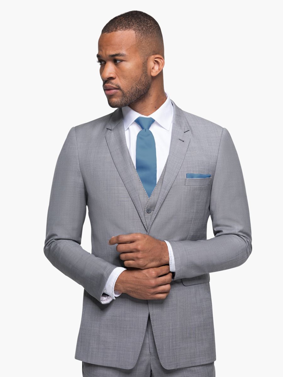 Gray Sharkskin Suit | Available in Modern and Slim
Available in Boys Sizes
100% Super 130's Wool
Notch Lapel
Matching Vest Available
Flat Front Pants
Hidden Flex-Fit Waistband