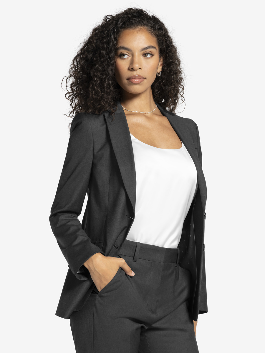Women's Charcoal Suit | The Women's Charcoal Suit Jacket features a classic straight-cut design that speaks to professionalism and sophistication. Ideal for weddings and corporate events, this jacket helps you project confidence and style.
The timeless gray color provides unmatched versatility, making it a smart investment for your wardrobe. This suit ensures you'll make a strong impression in any formal setting.